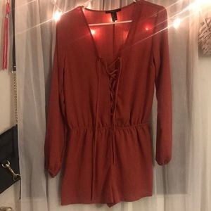 Burnt orange romper. Never worn